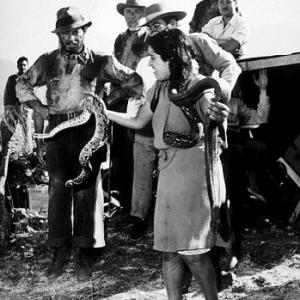 Humphrey Bogart and a rattlesnake handler on the set of Treaure of the Sierra Madre 1948 Warner Bros