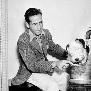 With his dog at home, circa 1936.