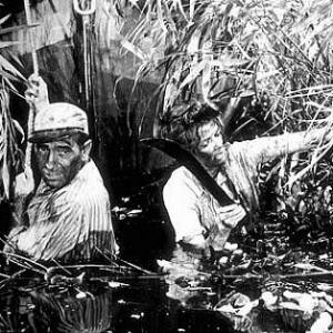 56366 Katharine Hepburn and Humphrey Bogart in The African Queen