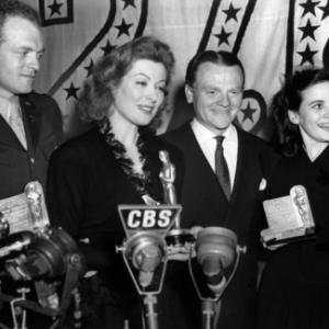 Teresa Wright (far right) with (left to right) Van Heflin, Greer Garson and James Cagney as they all hold the Motion Picture Academy's coveted 