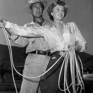 Gary Cooper and Barbara Stanwyck while on location in Mexico for Blowing Wild 1953
