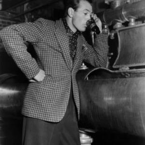 Gary Cooper testing the first batch of real honest-to-goodness beer to come through the vats at the Los Angeles Brewing Company circa 1935