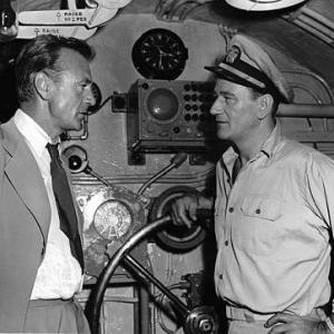 Gary Cooper visiting John Wayne on the set of 