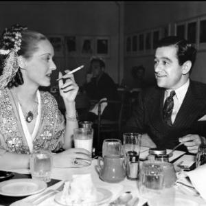 Jezebel Bette Davis and director William Wyler take a break during filming 1937 Warner Brothers