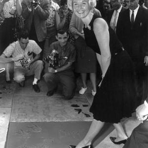 Doris Day At her footprint ceremony at The Mann Chinese Theater in Hollywood, California. January 19,1961