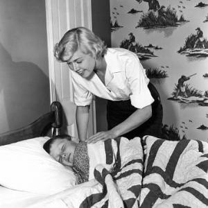 Doris Day Tucking son Terry to bed