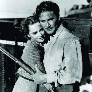 Still of Olivia de Havilland and Errol Flynn in Dodge City (1939)