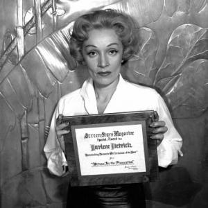 Marlene Dietrich receives an Outstanding Dramatic Performance of the Year award for Witness For The Prosecution 1957