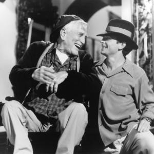 Still of Kirk Douglas and Michael J Fox in Greedy 1994