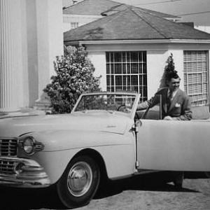 Clark Gable with his 1946 Lincoln Continental MW
