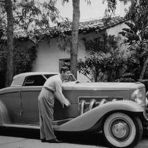 Clark Gable in his 1935 Duesenberg C. 1935 *M.W.*