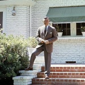 Clark Gable on front steps of his home in Encino Ca., July 1957.