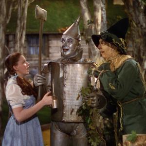 Still of Judy Garland, Ray Bolger and Jack Haley in The Wizard of Oz (1939)