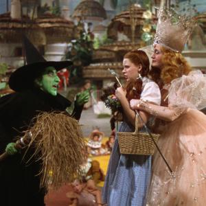 Still of Judy Garland, Billie Burke and Margaret Hamilton in The Wizard of Oz (1939)