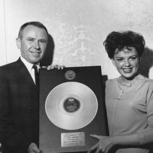 Judy Garland receiving Gold Record for Judy at Carnegie Hall