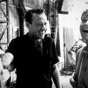 573467 Paris When It Sizzles William Holden tells Audrey Hepburn and director Richard Quine a story on set