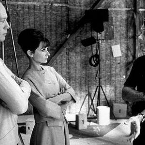 573465 Paris When It Sizzles William Holden tells Audrey Hepburn and director Richard Quine a story on set
