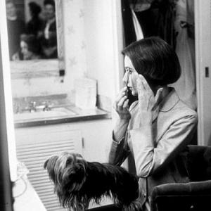 Audrey Hepburn with her pet dog Famous in her dressing room at Paramount Studios in Los Angeles CA 1957