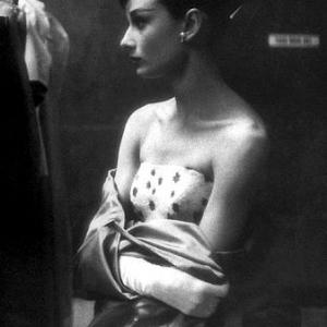 332233 Audrey Hepburn in Paramounts portrait gallery dressing room prior to attending the 27th Annual Academy Awards Ceremony