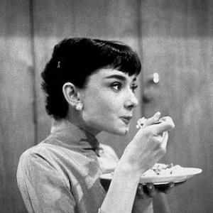 332332 Audrey Hepburn takes a quick lunch break during her first publicity shoot at Paramount