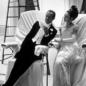 360418 My Fair Lady Audrey Hepburn and Rex Harrison relax behind the scenes 1964 Warner Bros