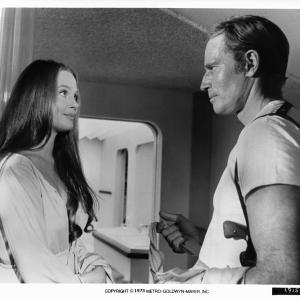 Still of Charlton Heston and Leigh TaylorYoung in Soylent Green 1973