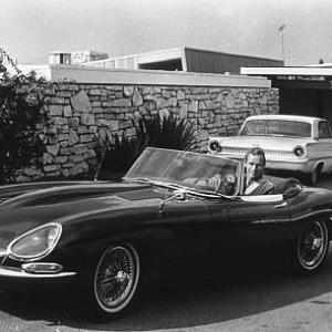 Charlton Heston in his 1967 E Type Jaguar C. 1967