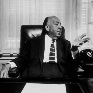 Alfred Hitchcock in his office at Universal Studios, 1957.