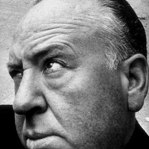 Alfred Hitchcock selfportrait with Bill Averys camera on set The Man Who Knew Too Much 1956