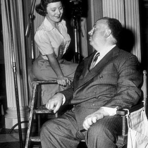 Alfred Hitchcock andhis daughter Patricia on the set of Strangers On A Train 1951
