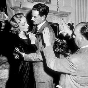 Marlene Dietrich  Hector MacGregor with director Alfred Hitchcock on the set of Stage Fright 1950 Warner