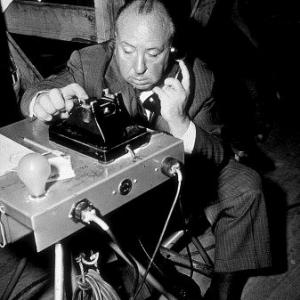 Alfred Hitchcock on teh set of Dial M For Murder