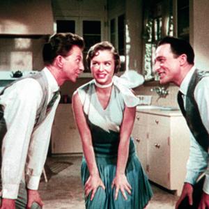 Still of Gene Kelly, Debbie Reynolds and Donald O'Connor in Singin' in the Rain (1952)
