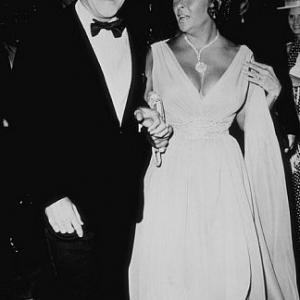 Elizabeth Taylor and Gene Kelley attend the opening of Thats Entertainment