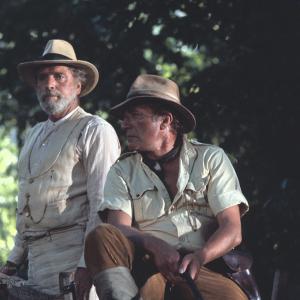 Still of Burt Lancaster and Nigel Davenport in The Island of Dr. Moreau (1977)