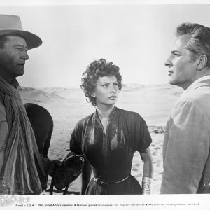 Still of Sophia Loren John Wayne and Rossano Brazzi in Legend of the Lost 1957