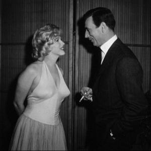 M. Monroe & Yves Montand at party for 