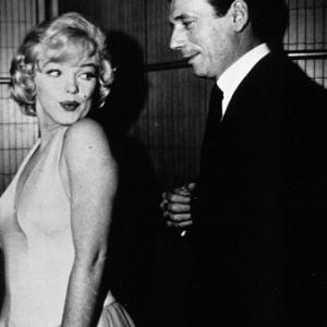 M. Monroe & Yves Montand at publicity party for 