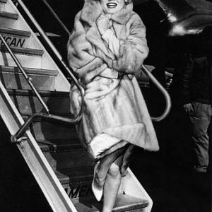 Marilyn Monroe arriving in Chicago for the premiere of 
