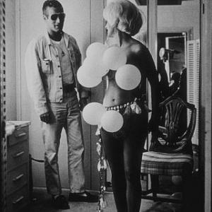 Paul Newman and Joanne Woodward in her dressing room during a break from filming The Stripper 1963