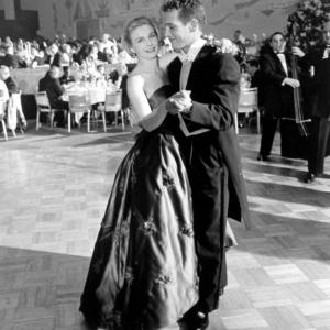 Joanne Woodward dances with husband Paul Newman following her Oscar win for best actress in 1957's 