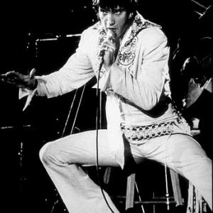 Elvis Presley performing at the Houston Astrodome in Houston Texas 22870