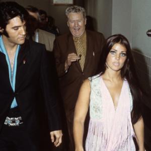 Elvis Presley with Priscilla and father Vernon circa 1970s