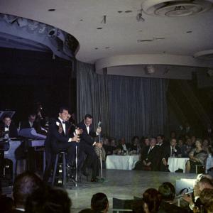 Dean Martin Sammy Davis Jr and Frank Sinatra performing live circa 1960
