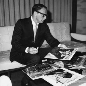 Frank Sinatra signing albums circa 1960s