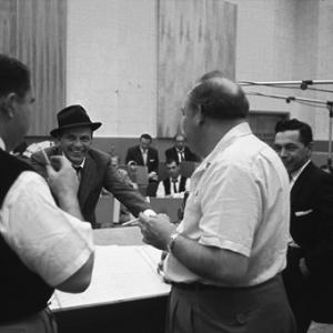 Frank Sinatra in the recording studio with Billy May circa 1959