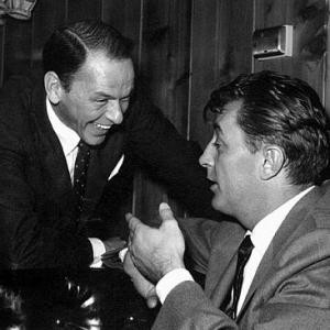 Frank Sinatra and Robert Mitchum at Sinatra's 42nd birthday party held at the Villa Capri, 1957. Vintage silver gelatin, 9.5x7.5, signed. $800 © 1978 Joe Shere MPTV