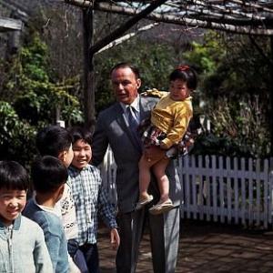 Frank Sinatra visits Japanese orphans during his children's charities tour 1962 © 1978 Ted Allan