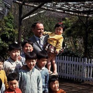Frank Sinatra visitis Japanese orphans during his childrens charities tour 1962  1978 Ted Allan