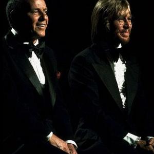 Frank Sinatra and John Denver perform on Sinatra and Friends television special 1977 ABC  1978 Bud Gray